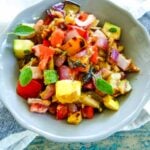 Diced grilled summer vegetables with fresh oregano.