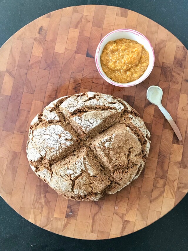 Gorgeous crusty loaf with a side of orange marmalade.