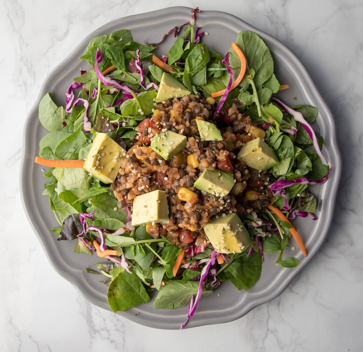 Lentil and Cauli-Rice Stuffing on top of greens for a taco salad.
