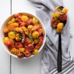 A spoonful of colorful roasted cherry tomatoes