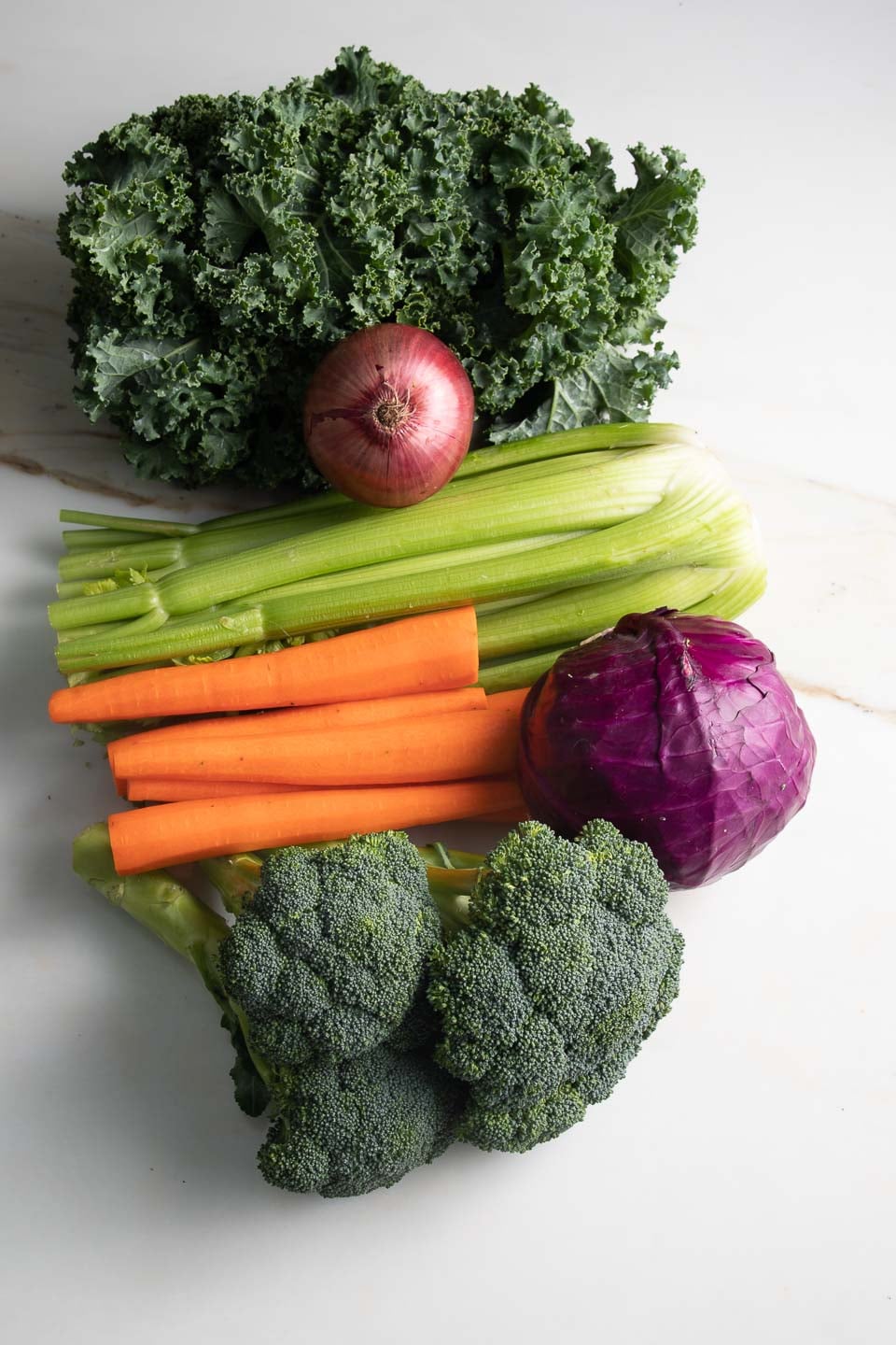 kale, onion, celery, carrots, cabbage, broccoli