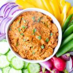 Bright Vegetables surrounding a rich red dip