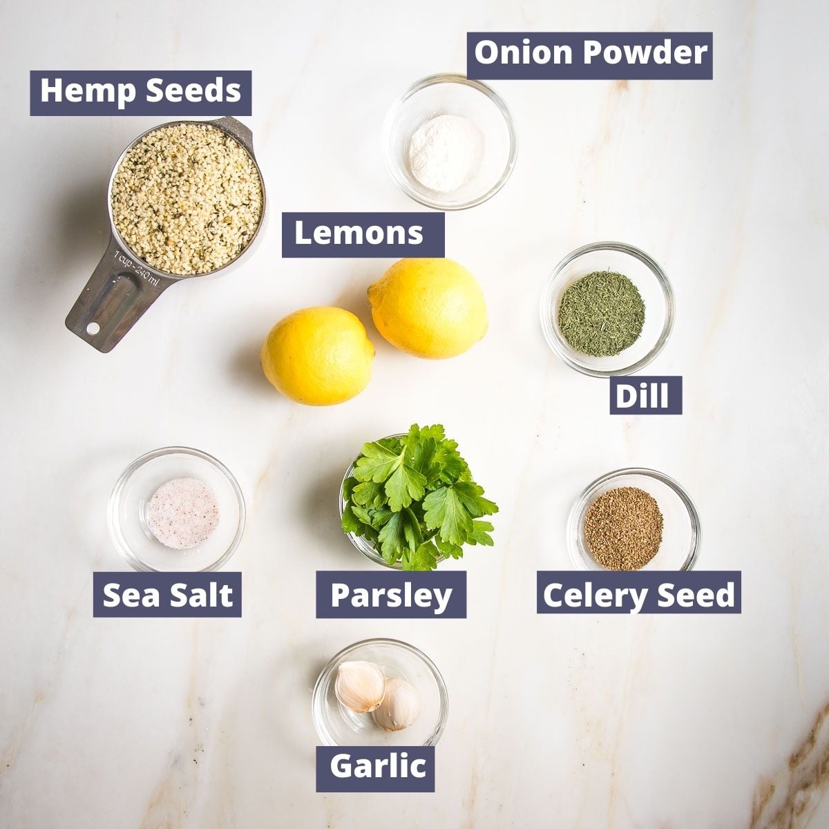 Healthy Ranch Dressing ingredients labeled: hemp seeds, lemons, parsley, onion powder, celery seed, dill, sea salt and garlic.