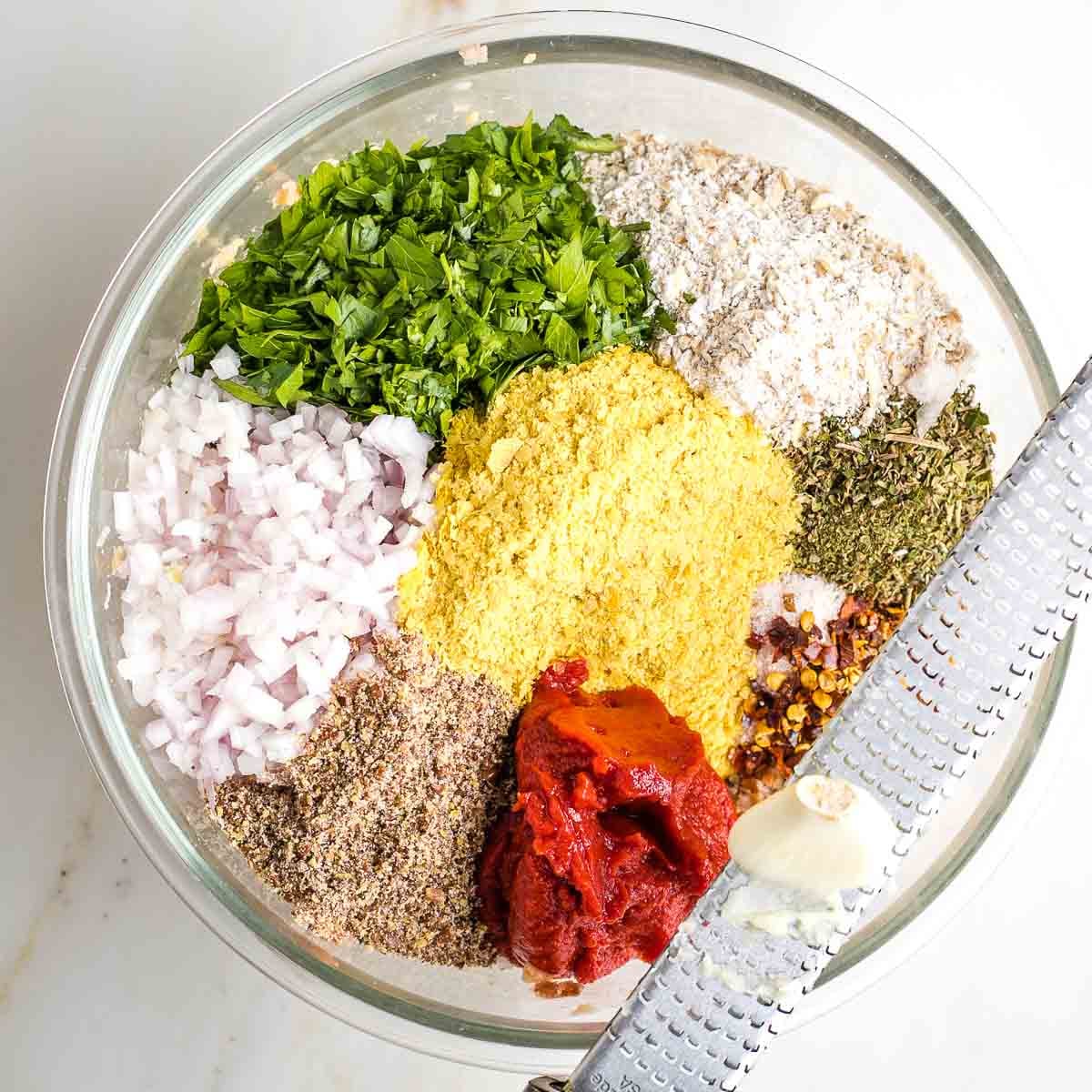 Mashed beans plus nutritional yeast, parsley, ground flax, seasoning and grated garlic.