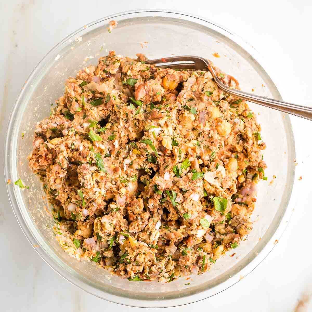 Mashed beans and spices form the batter to vegan meatballs.
