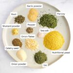Labeled ingredients: nutritional yeast, garlic powder, basil, parsley, mustard, pepper, onion powder, onion flakes, celery seed, dill.