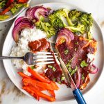 Rice, bbq tofu, red peppers, broccoli and red onions.
