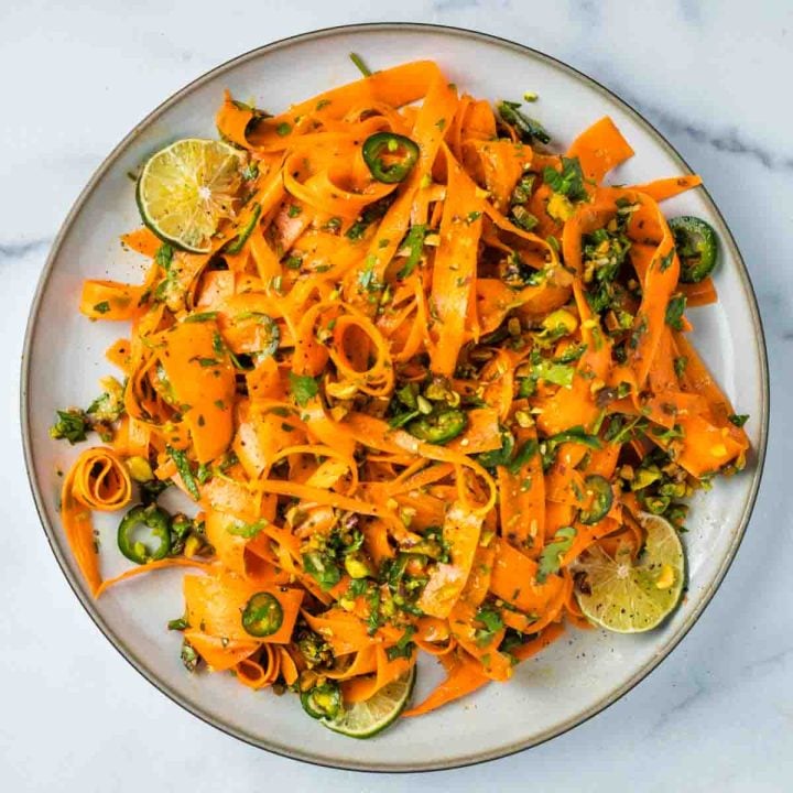 Ribbons of carrots, sprinkled with sliced jalapenos, chopped parsley and pistachios.