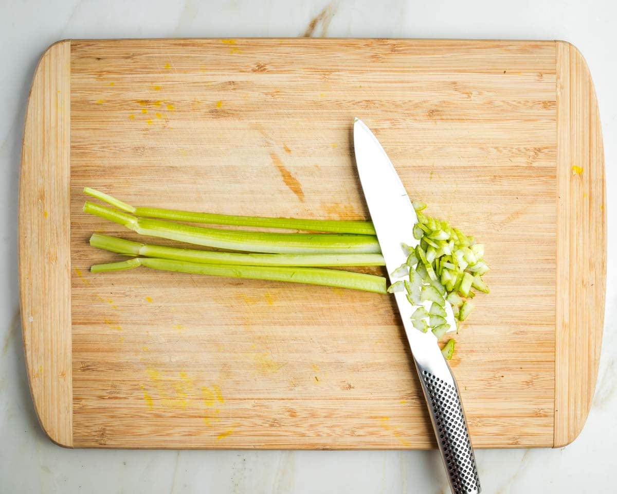 One stalk of celery cut lengthwise into strips and then across to make small diced pieces.