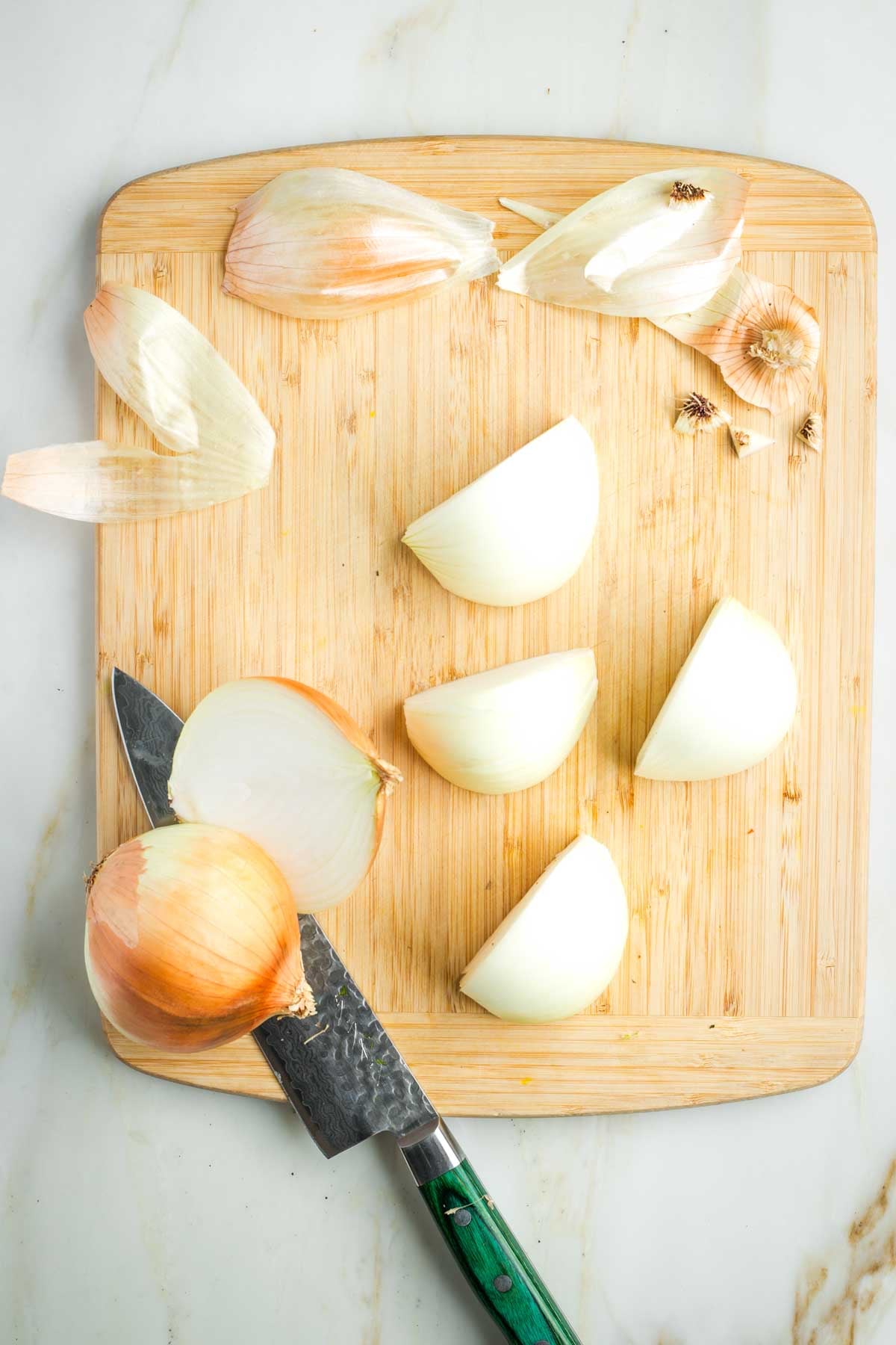 Onions, peeled and cut into quarters.