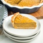 Side view of a perfect slice of pumpkin pie.
