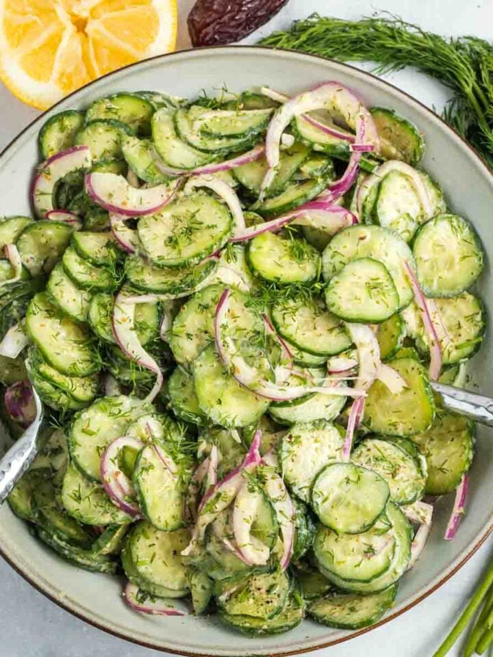Thinly sliced cucumber and red onion with creamy lemon dill dressing.