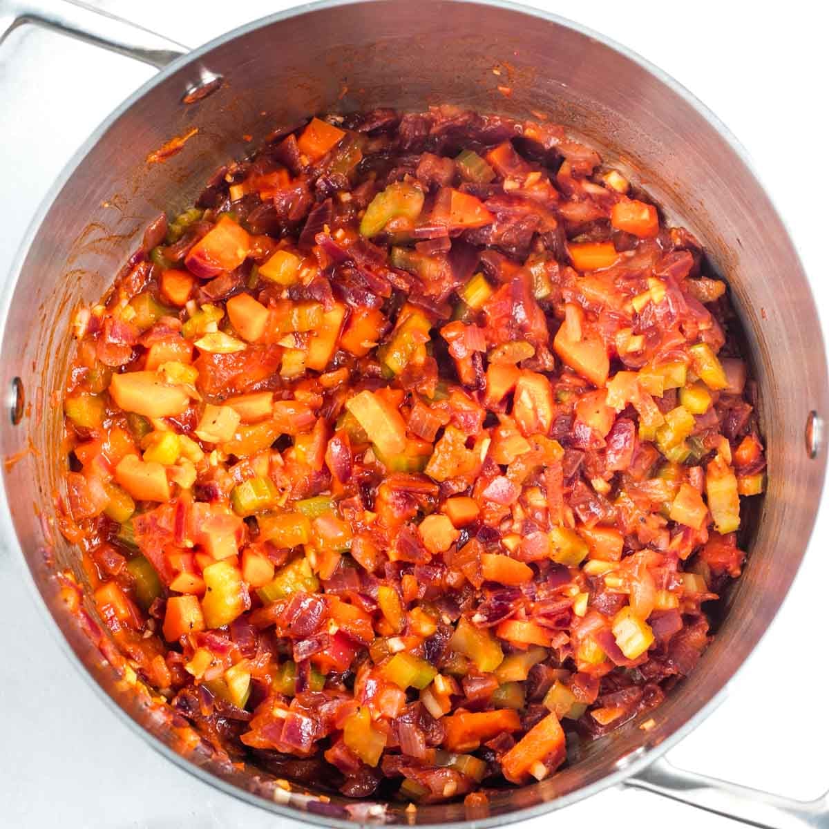 Onion, carrot and celery, sauteed with tomato paste. 