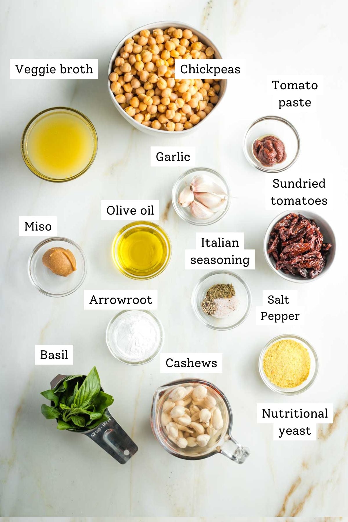 Ingredients labeled: chickpeas, veggie broth, miso, sun dried tomatoes, garlic, basil, arrowroot, olive oil, spices and nutritional yeast.