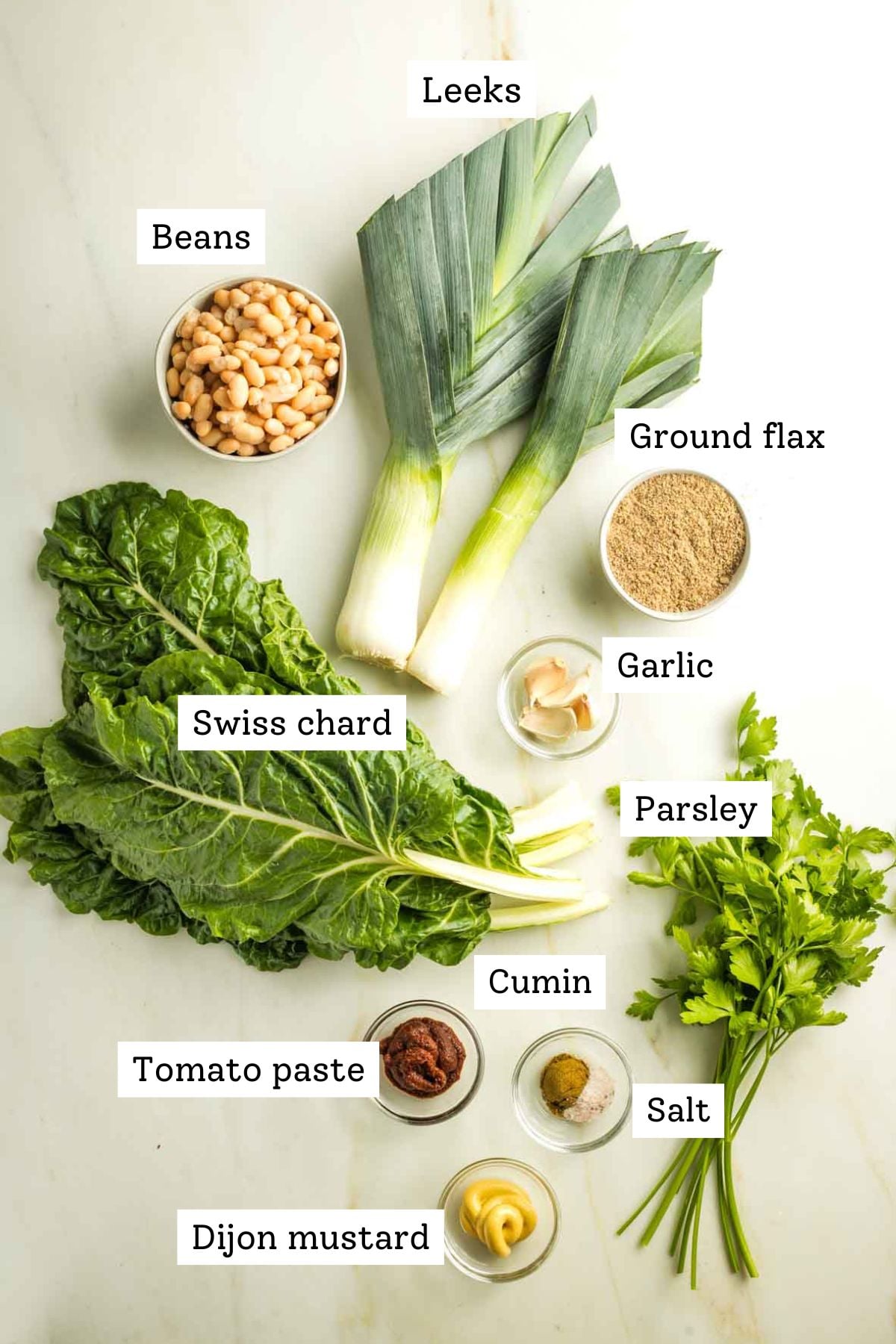 Labeled ingredients: leeks, beans, Swiss chard, parsley, ground flax, garlic,mustard, tomato paste.