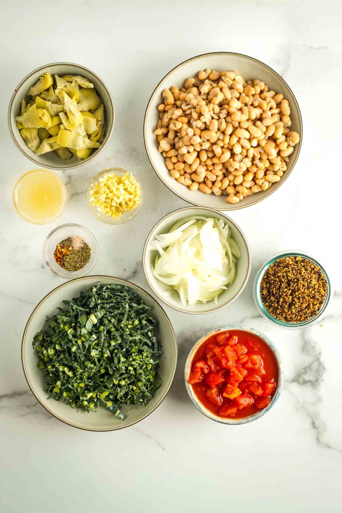 Prepped ingredients for a lemony white bean skillet dinner.